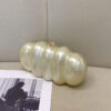 Oyster Glow Clutch